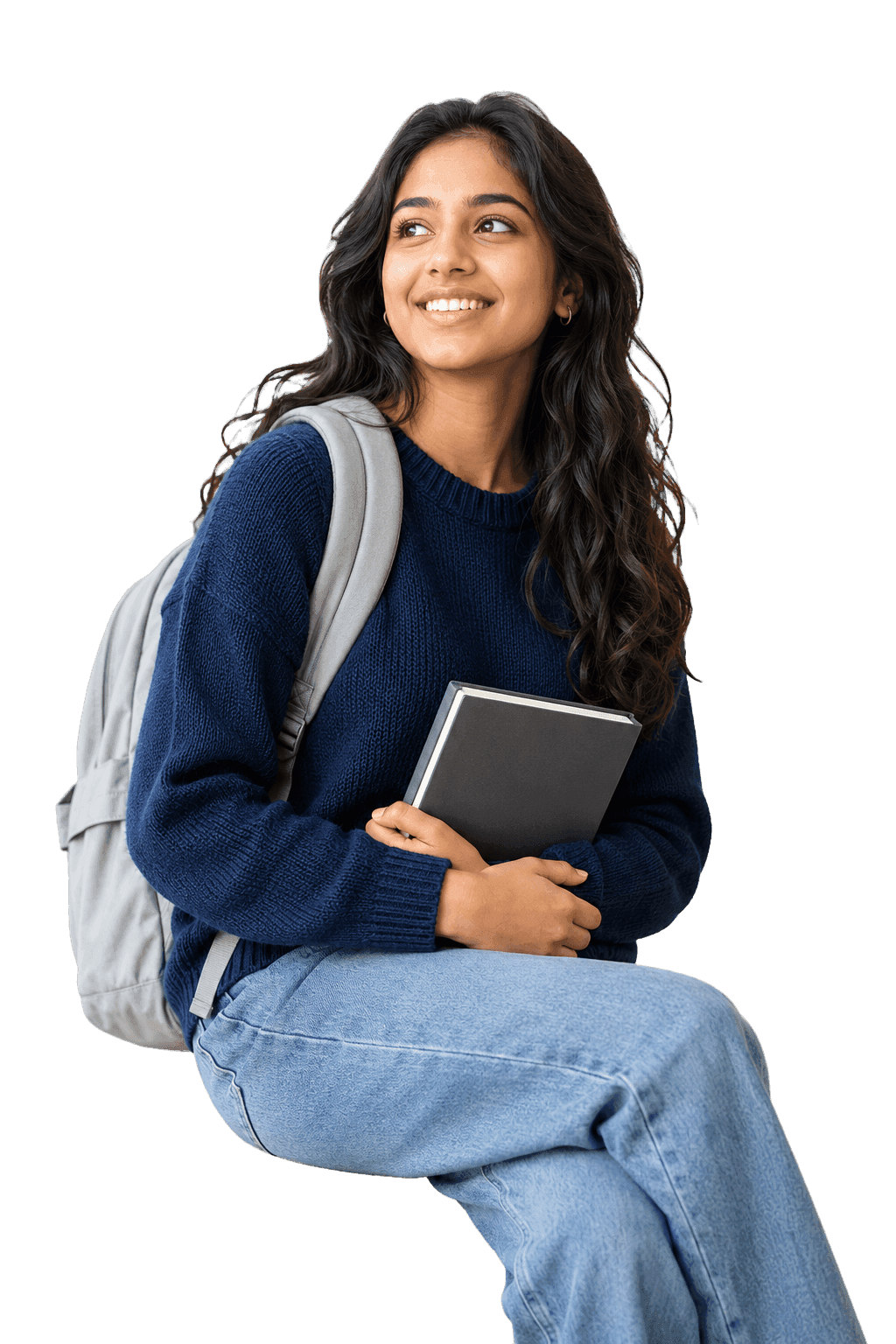 Student with a backpack looking ahead in a bright school library