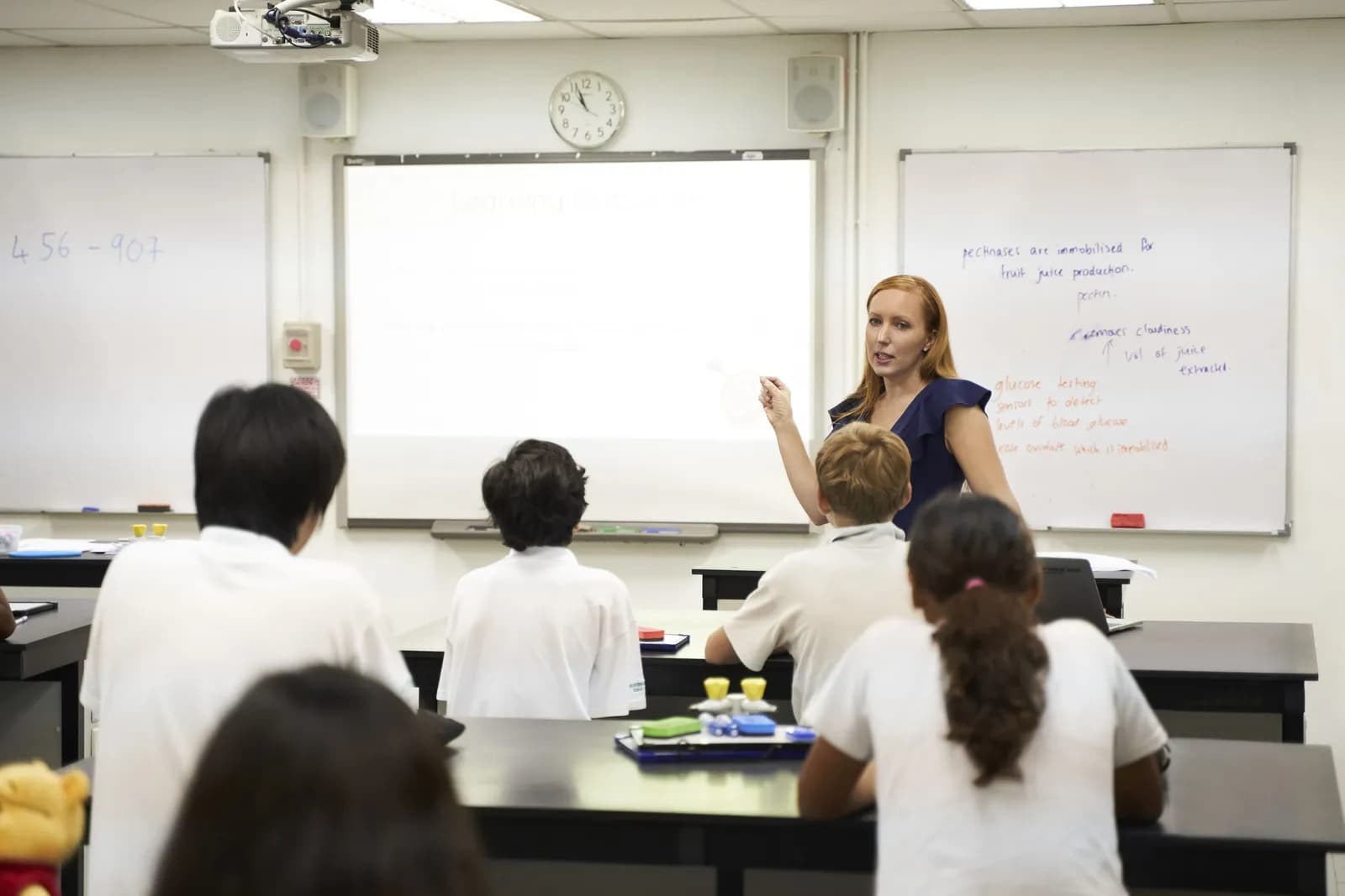 Secondary students in a bright science classroom at Garden International School Kuala Lumpur